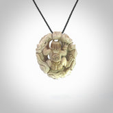 Hand carved Raiden Pendant. Made from Red Deer antler in New Zealand. Unique Japanese necklace hand made from deer antler by master bone carver Fumio Noguchi. Spectacular collectable work of art, made to wear. One only pendant, delivered to you at no extra cost with express courier.